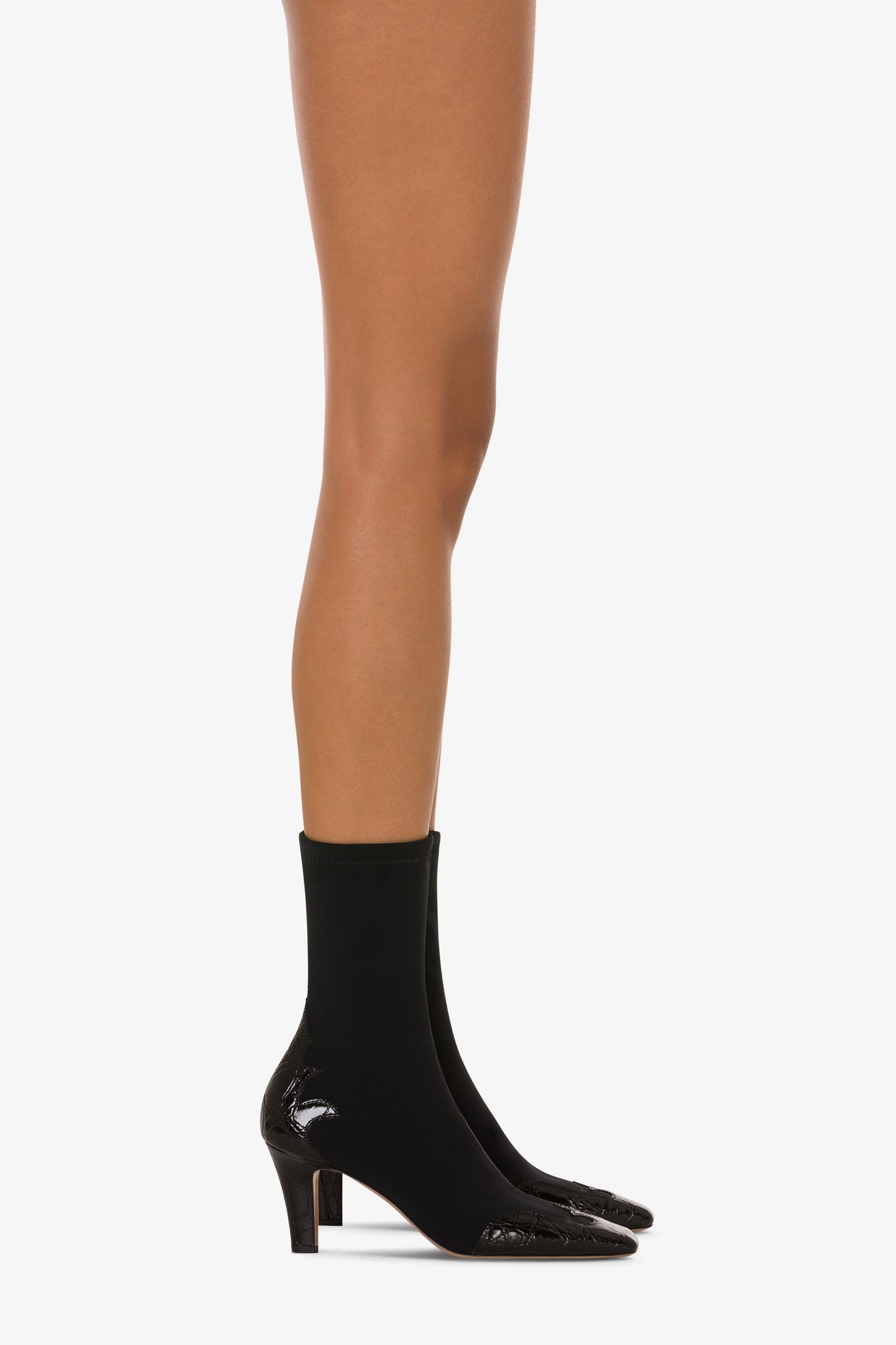 Bottes en cuir noir gaufre et extensible