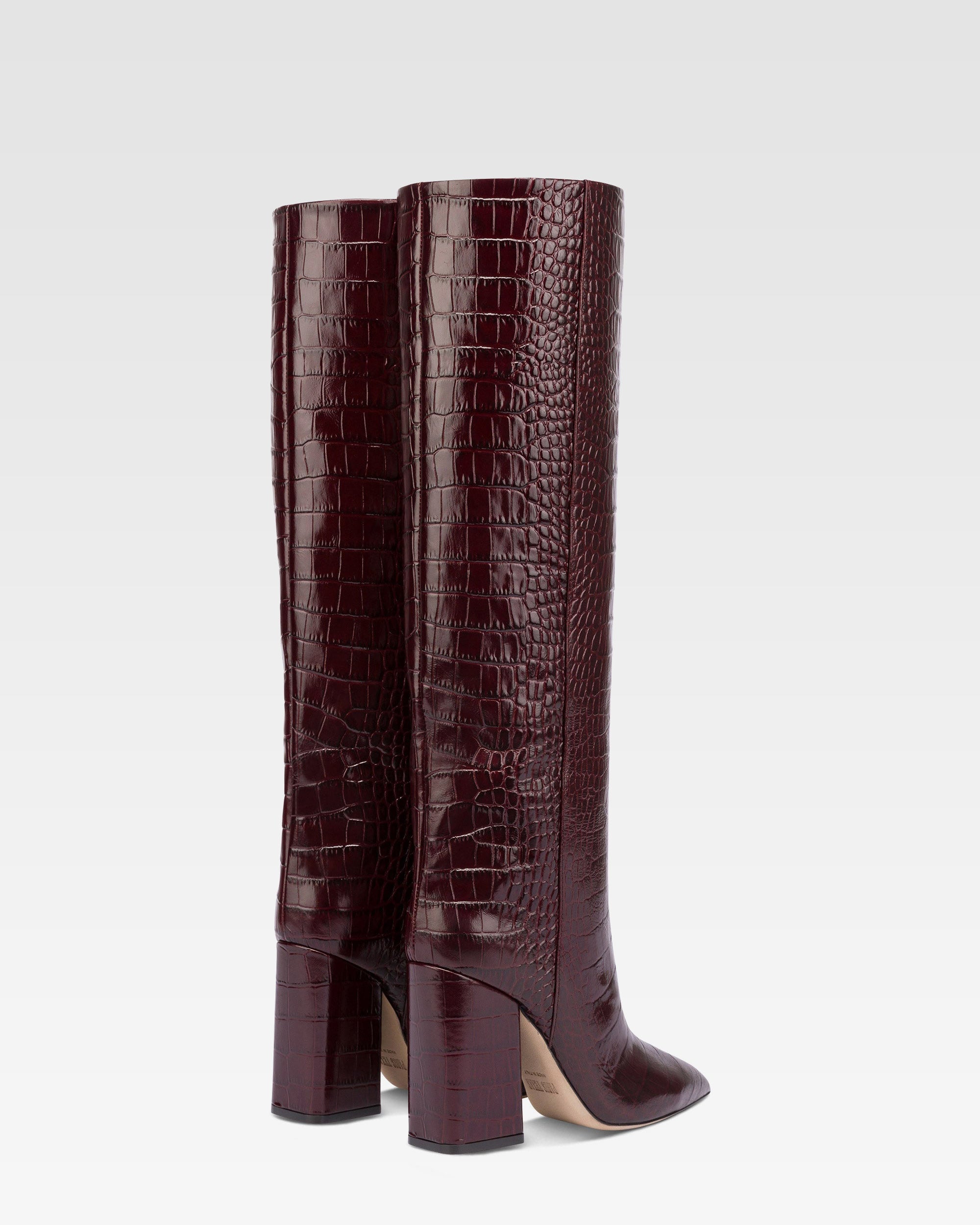 Knee-high boots in rouge noir soft croco-embossed leather
