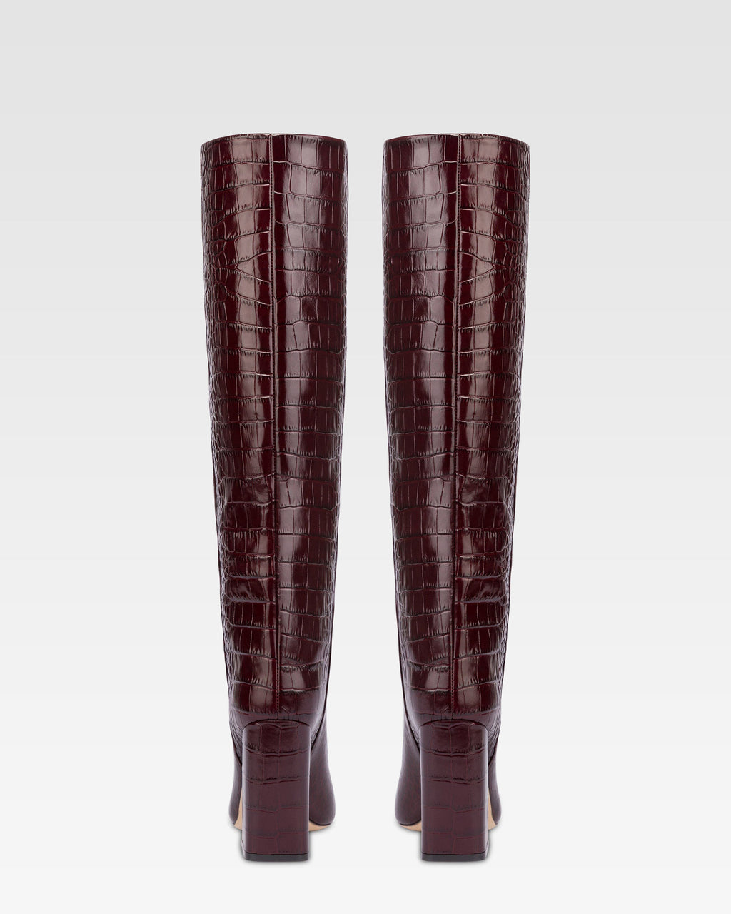 Knee-high boots in rouge noir soft croco-embossed leather