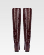 Knee-high boots in rouge noir soft croco-embossed leather
