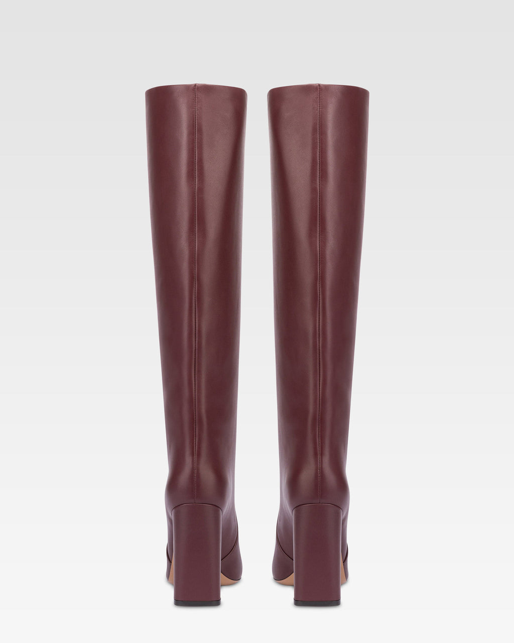 Knee-high boots in smooth burgundy leather