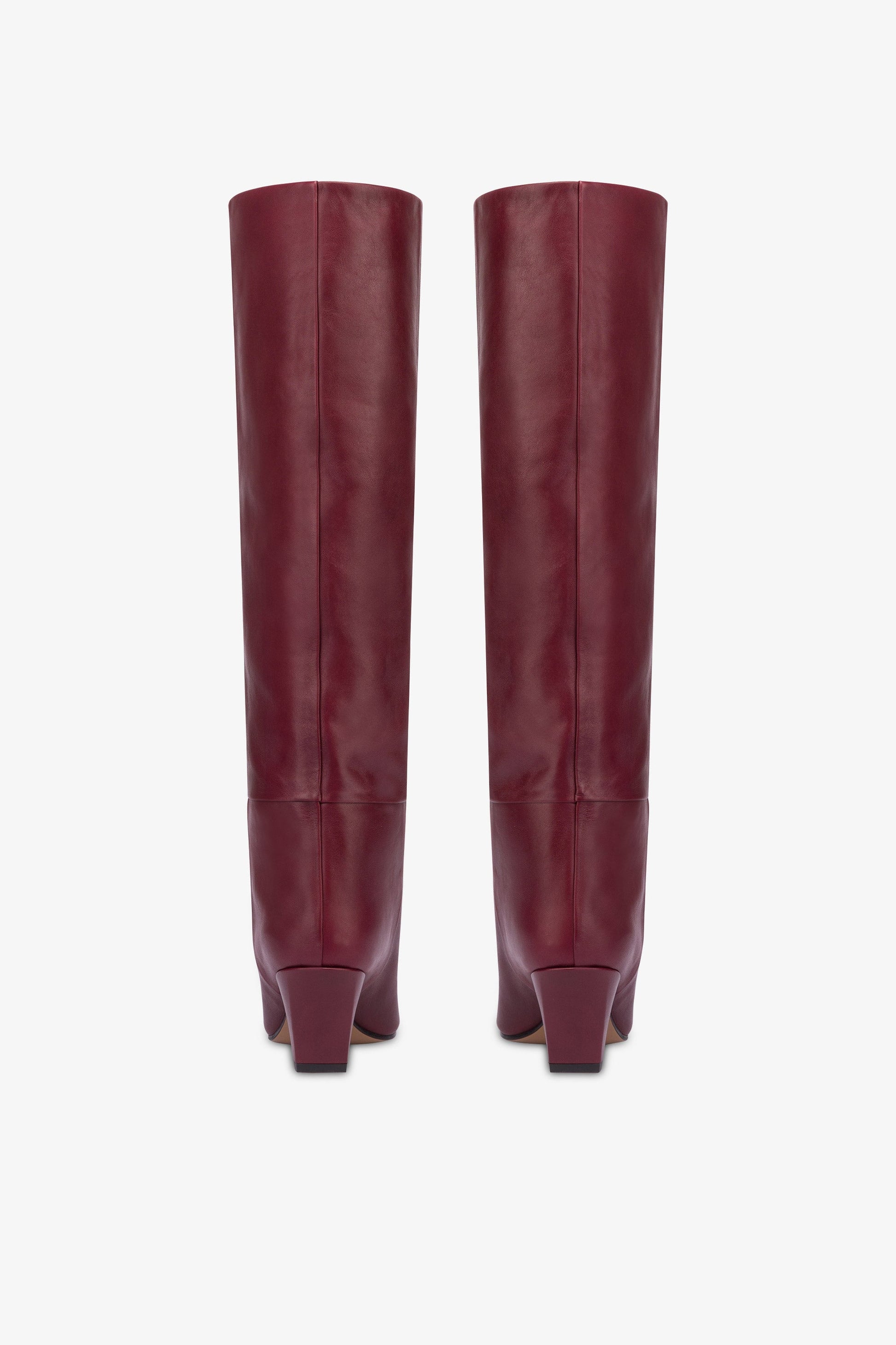 Knee-high, long pointed boot in supple rouge noir leather