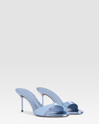 Mules in denim-colored, mirror-effect leather