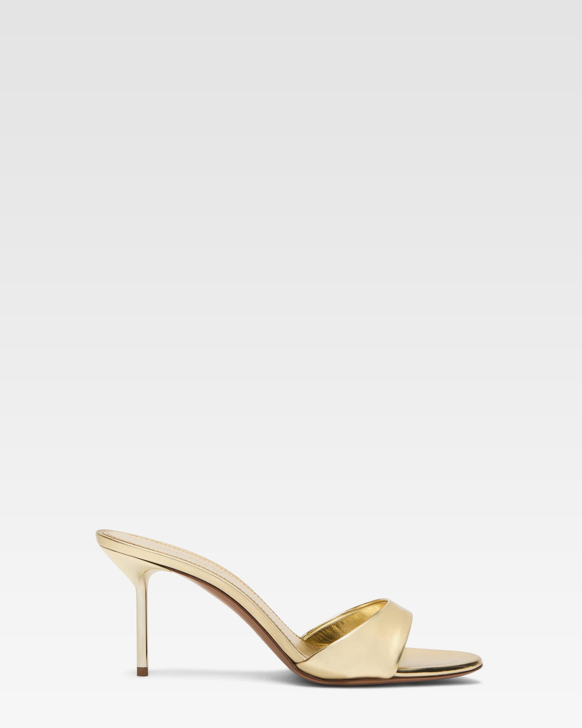 Mules in gold mirror leather