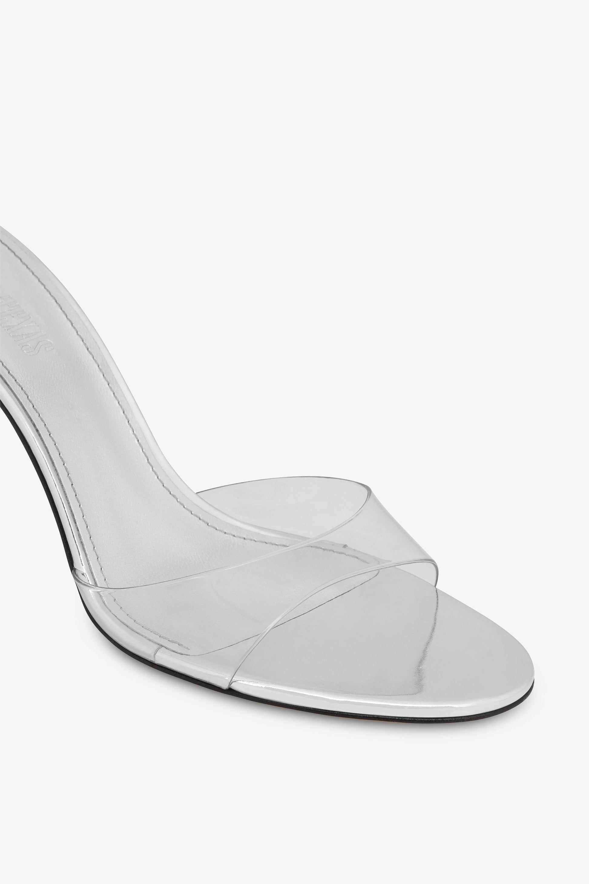 Almond-toe mules in supple silver PVC-mirror leather