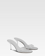 Mules en PVC y piel espejada