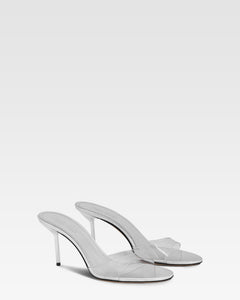 Mules en PVC y piel espejada