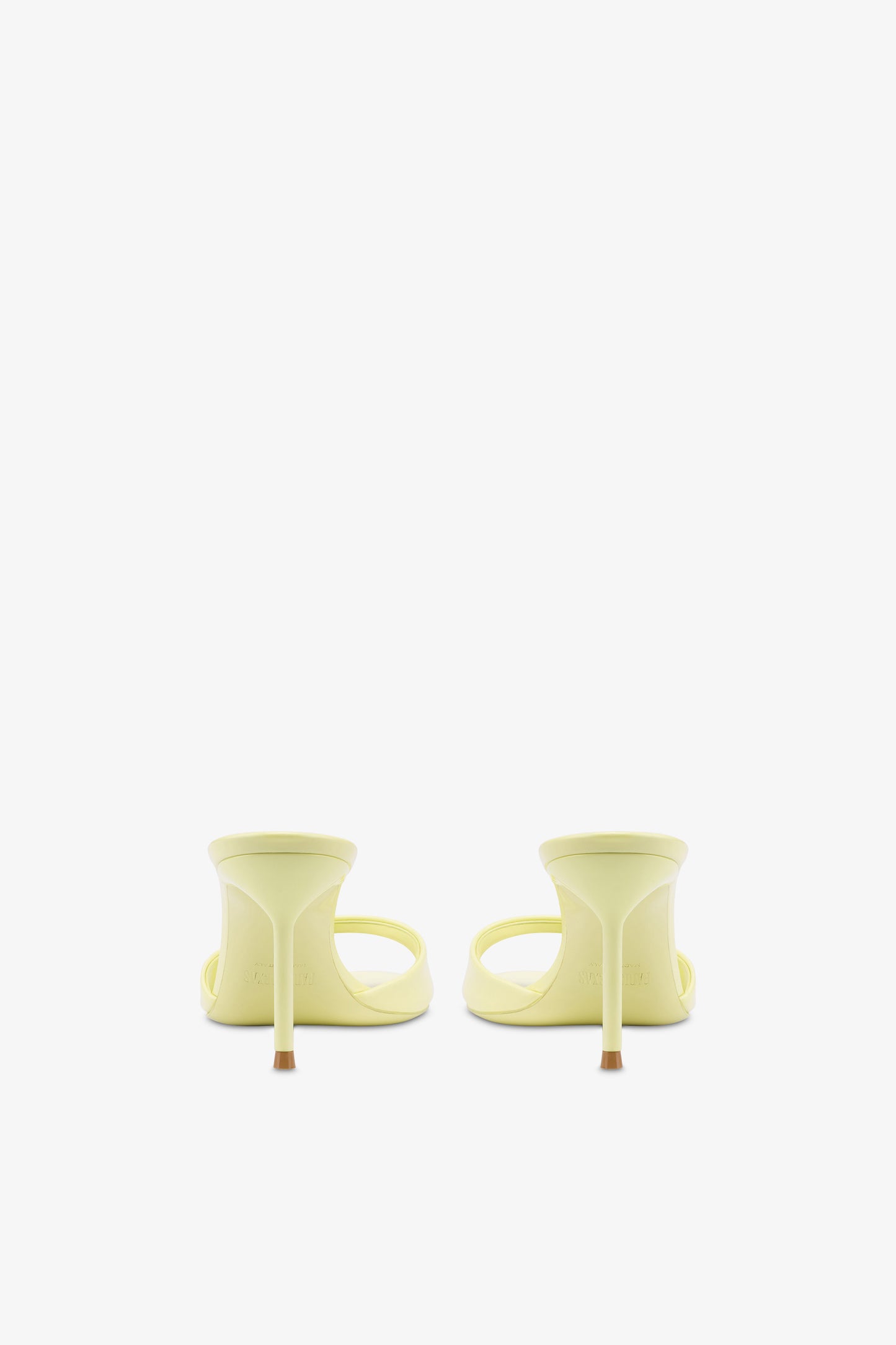 Mules in light yellow patent leather