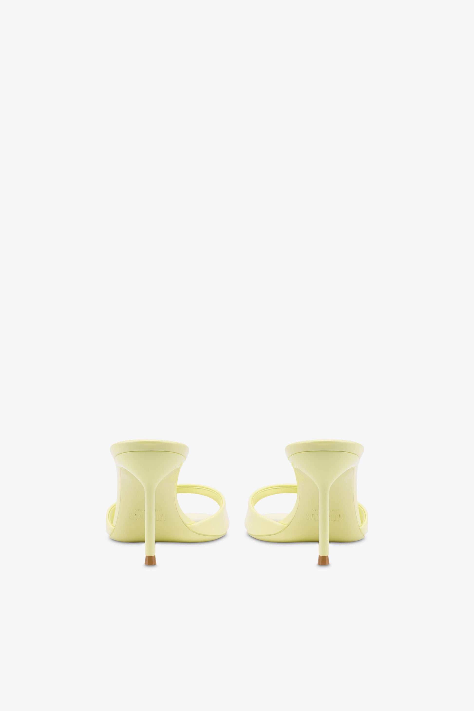 Mules in light yellow patent leather