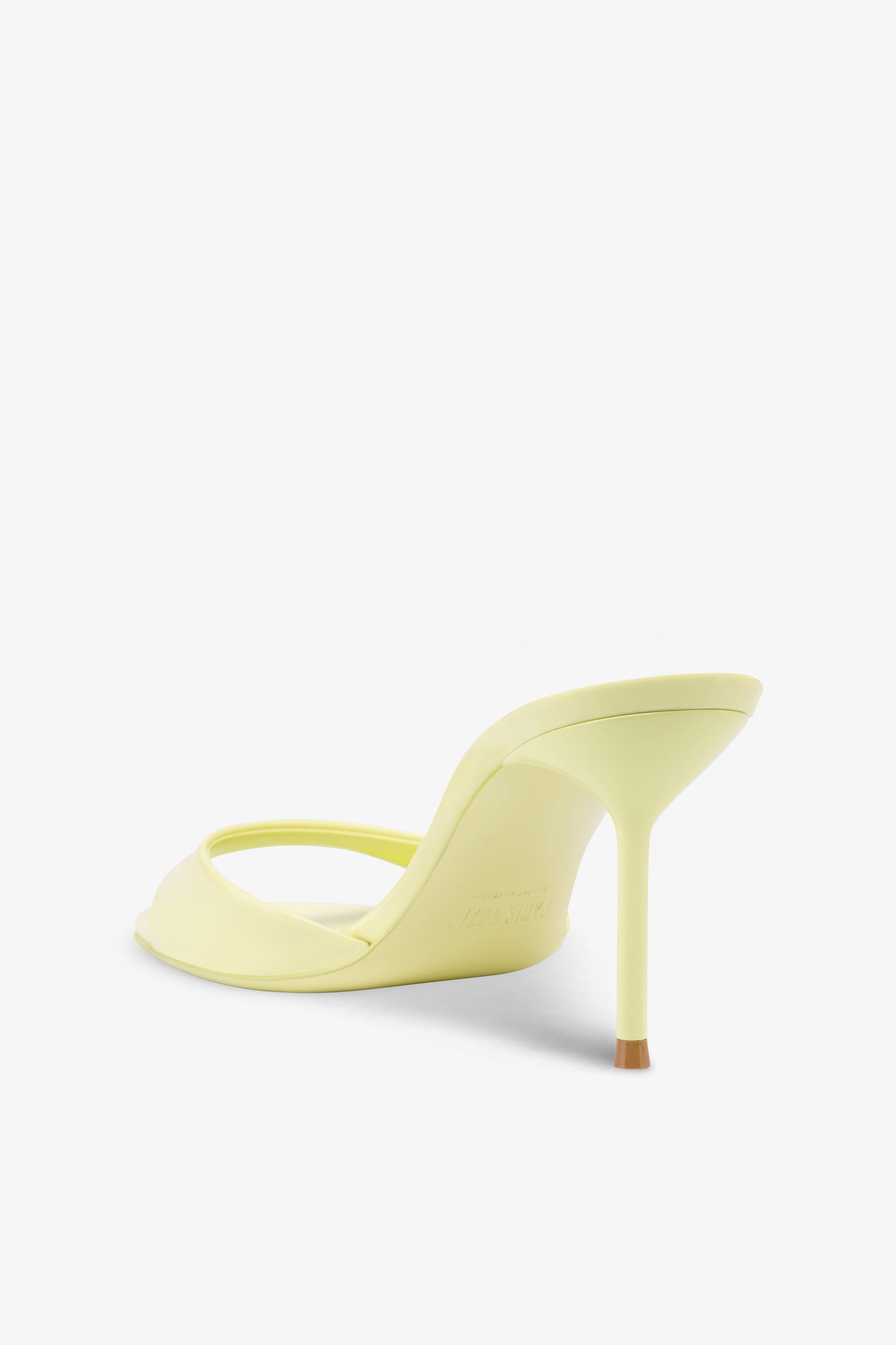 Mules in light yellow patent leather