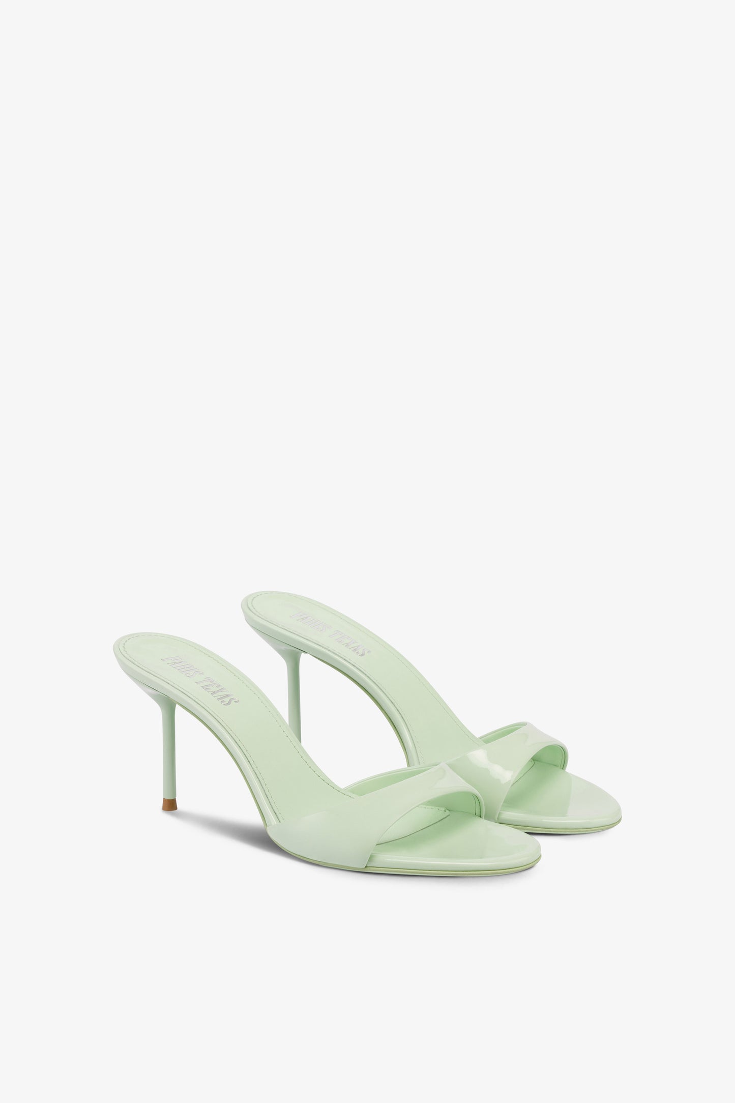 Mules in mint patent leather