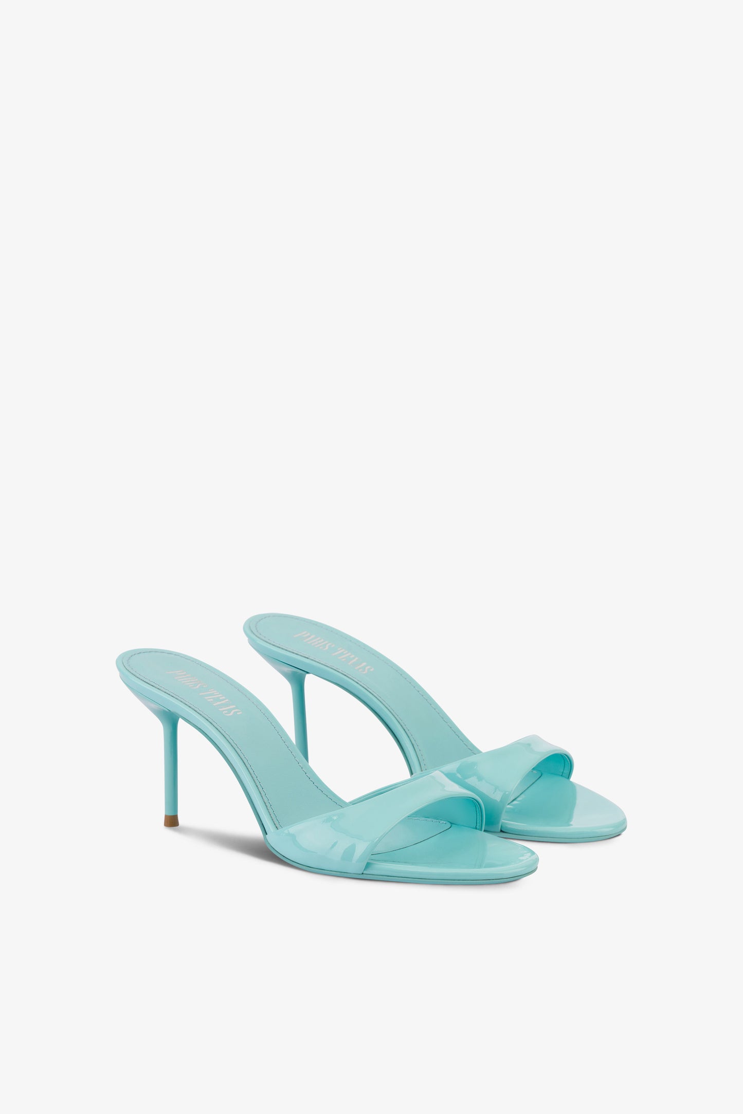 Mules in turquoise patent leather