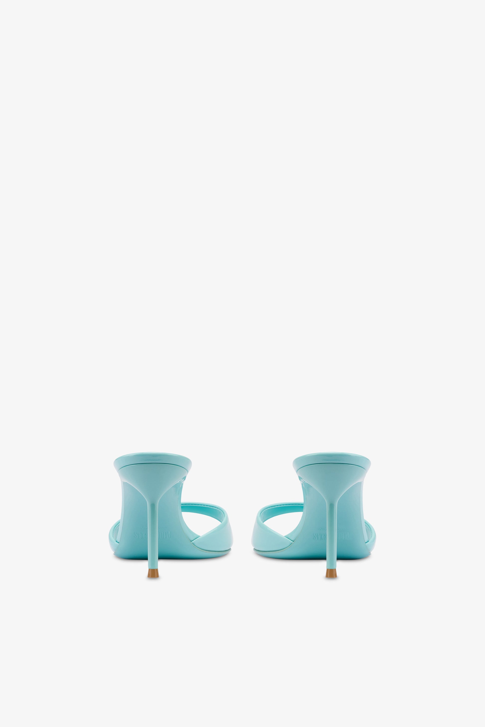 Mules in turquoise patent leather