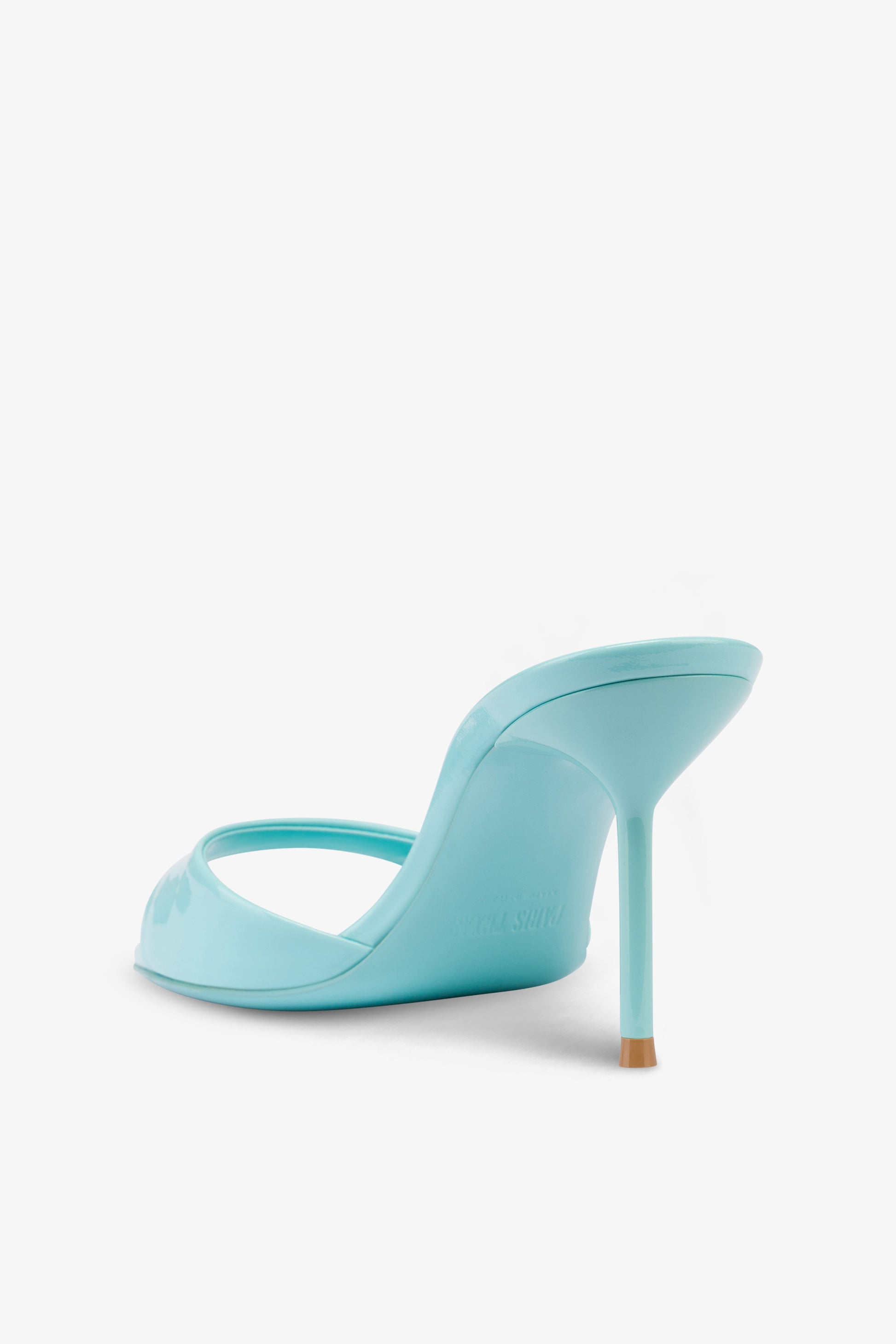 Mules in turquoise patent leather