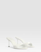Mules in optic white patent leather
