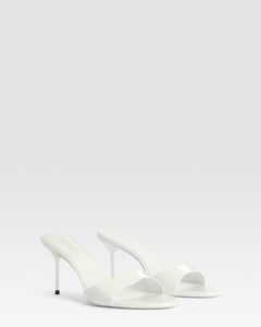 Mules in optic white patent leather