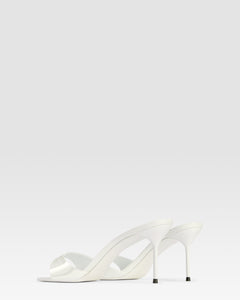 Mules in optic white patent leather