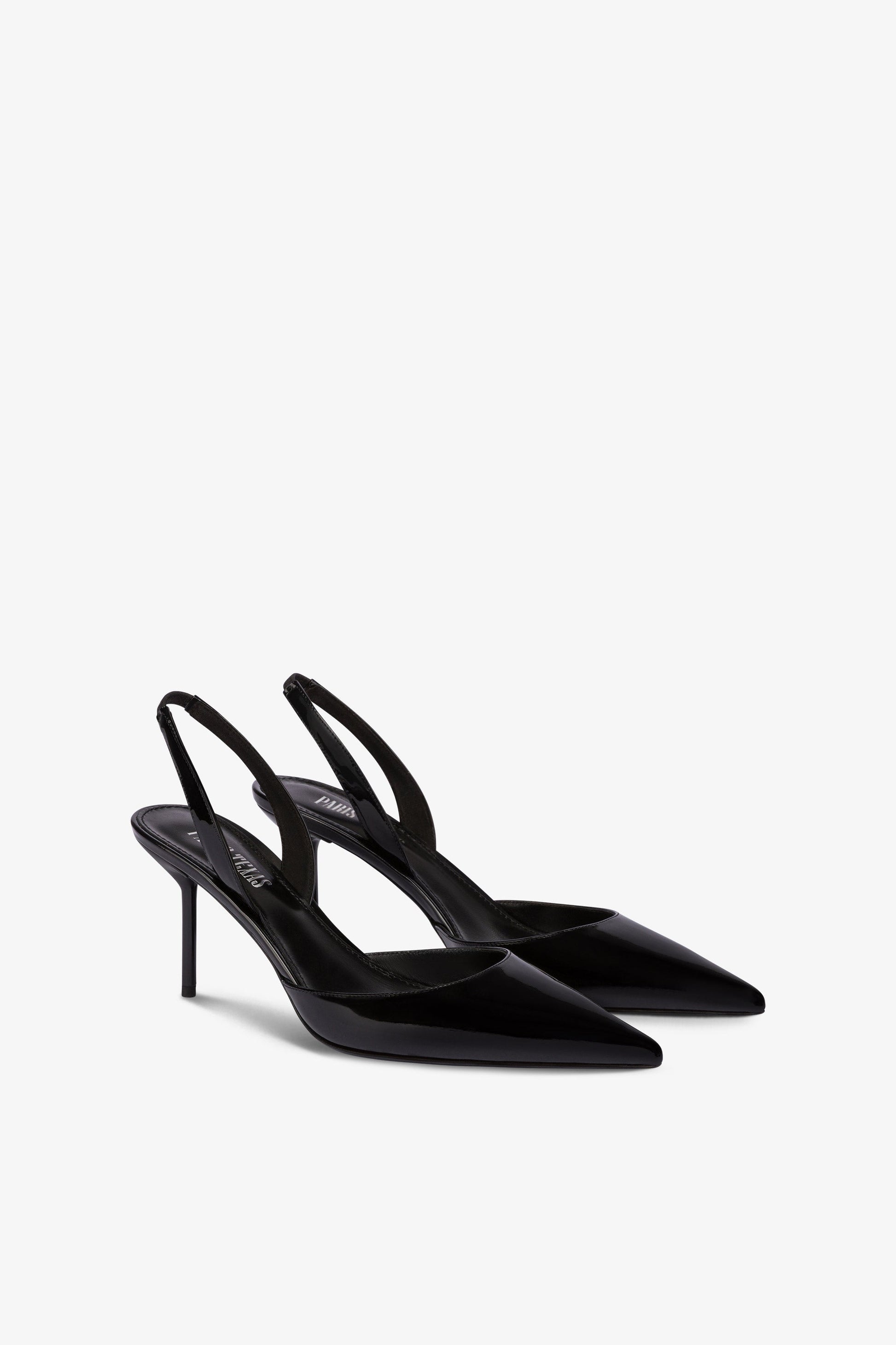 Long, pointed slingbacks in patent black leather