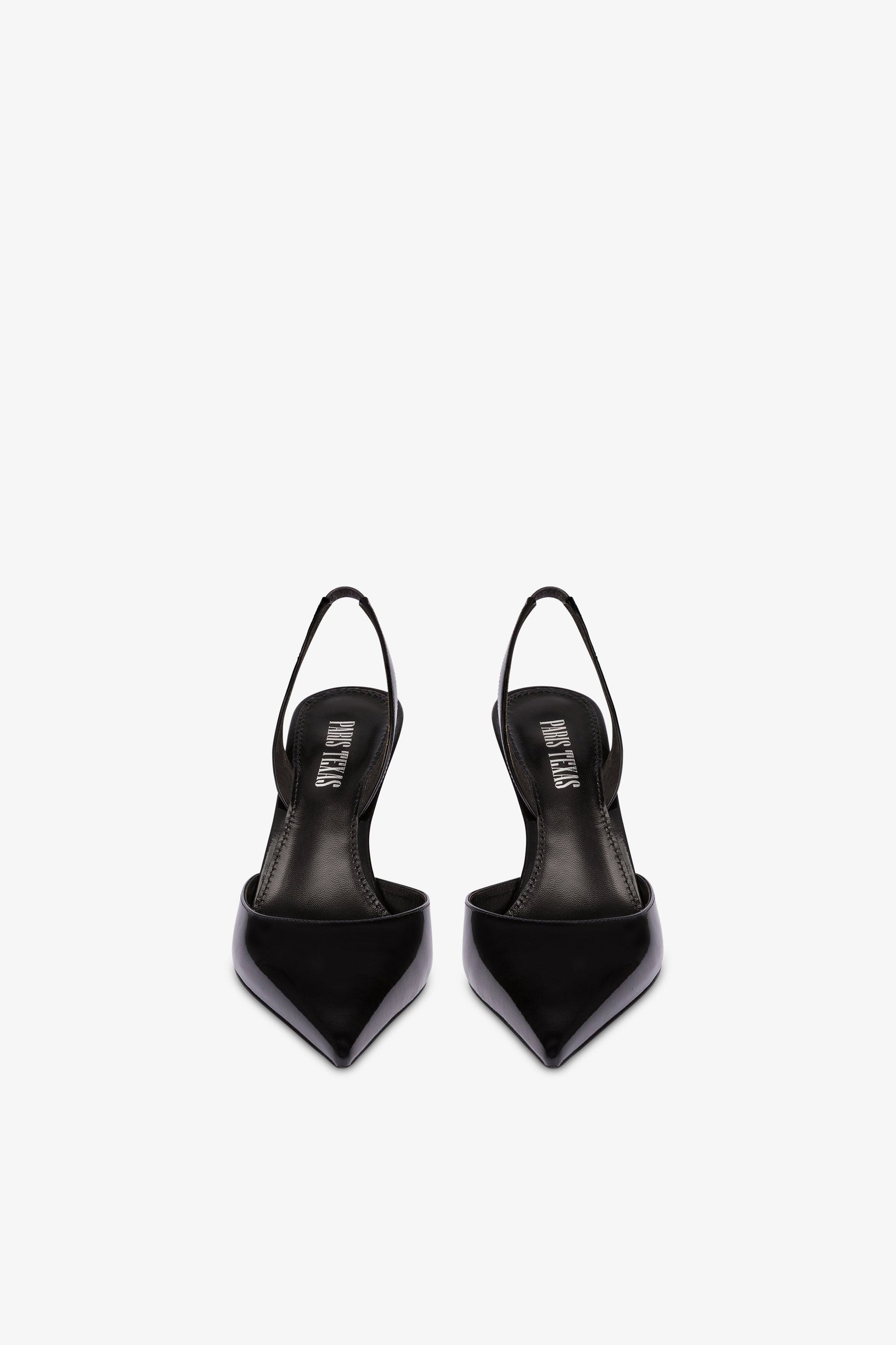 Long, pointed slingbacks in patent black leather