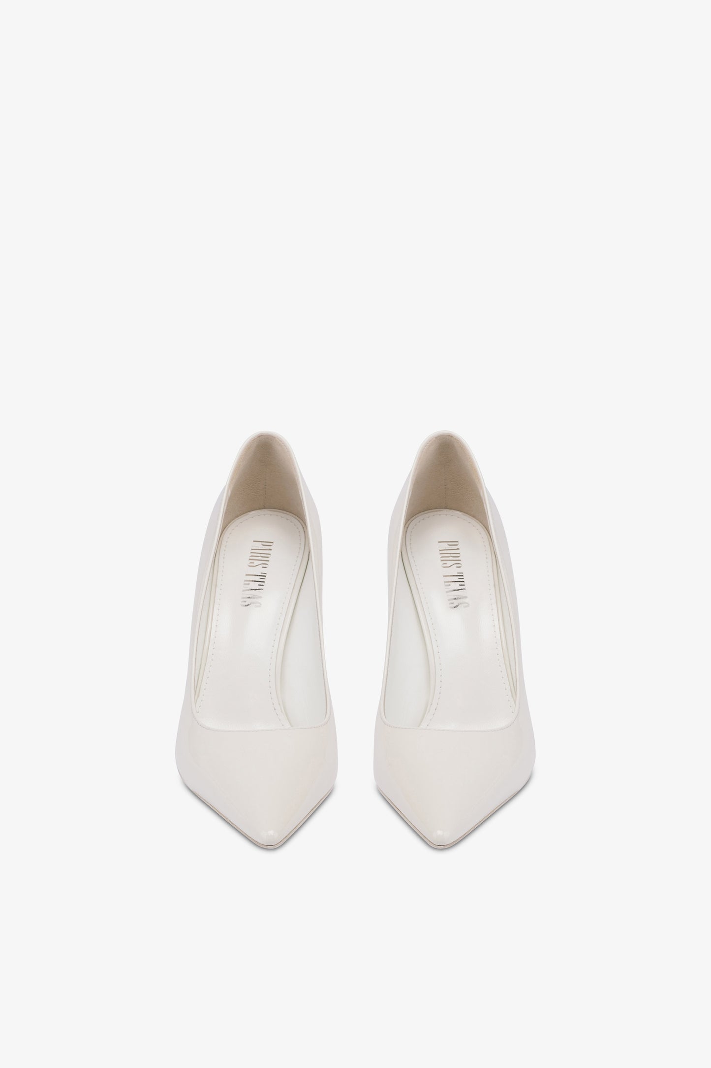 Pumps in white patent leather