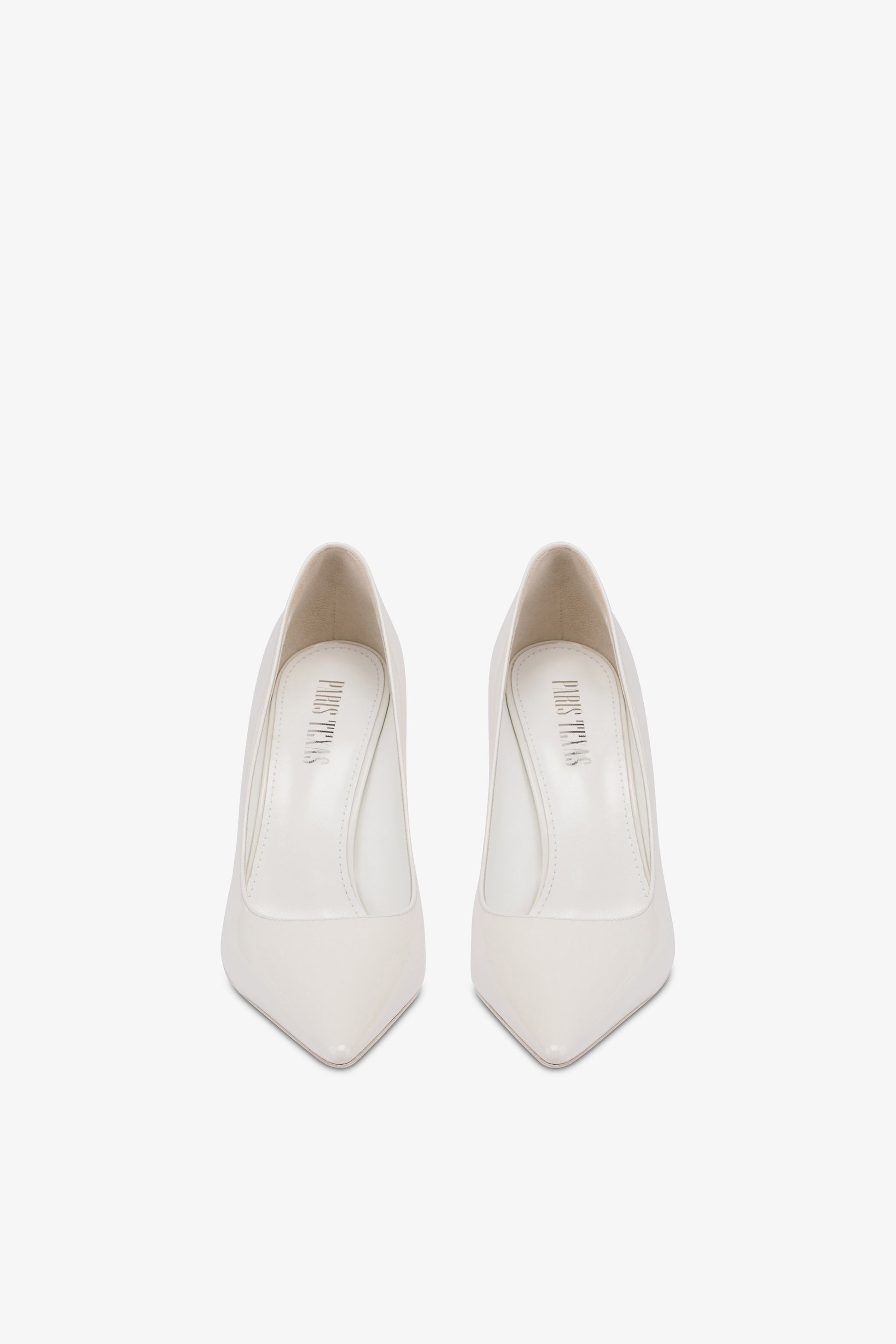 Pumps in white patent leather