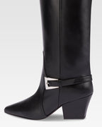 Long, pointed knee-high boots in smooth black leather