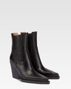 Stivaletti a punta altezza caviglia in pelle nera lucida effetto vintage