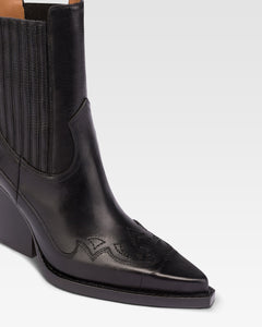 Stivaletti a punta altezza caviglia in pelle nera lucida effetto vintage