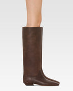 Boots in ebony vintage-effect calf leather