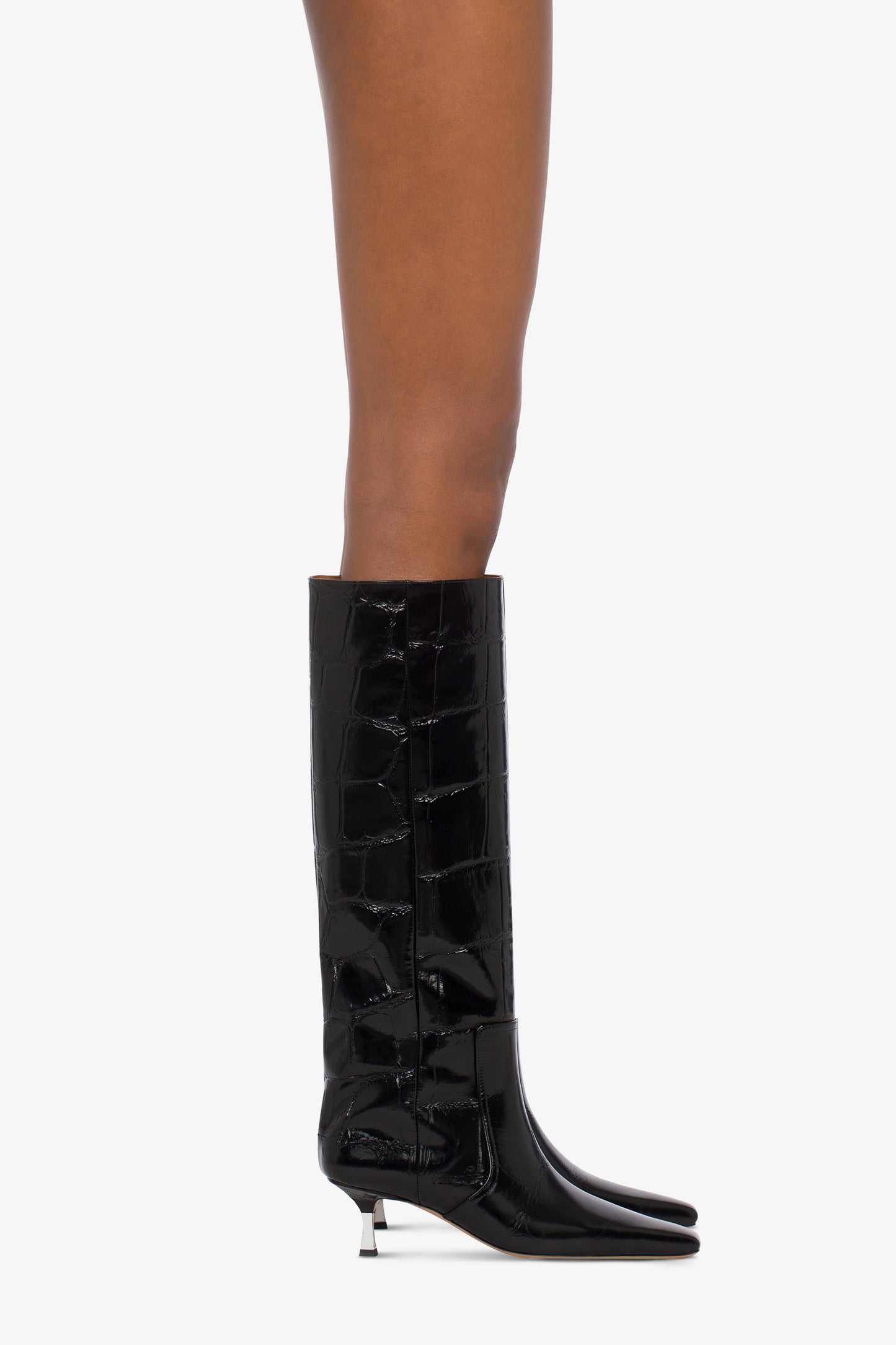 Knee-high boots in black croco-embossed leather