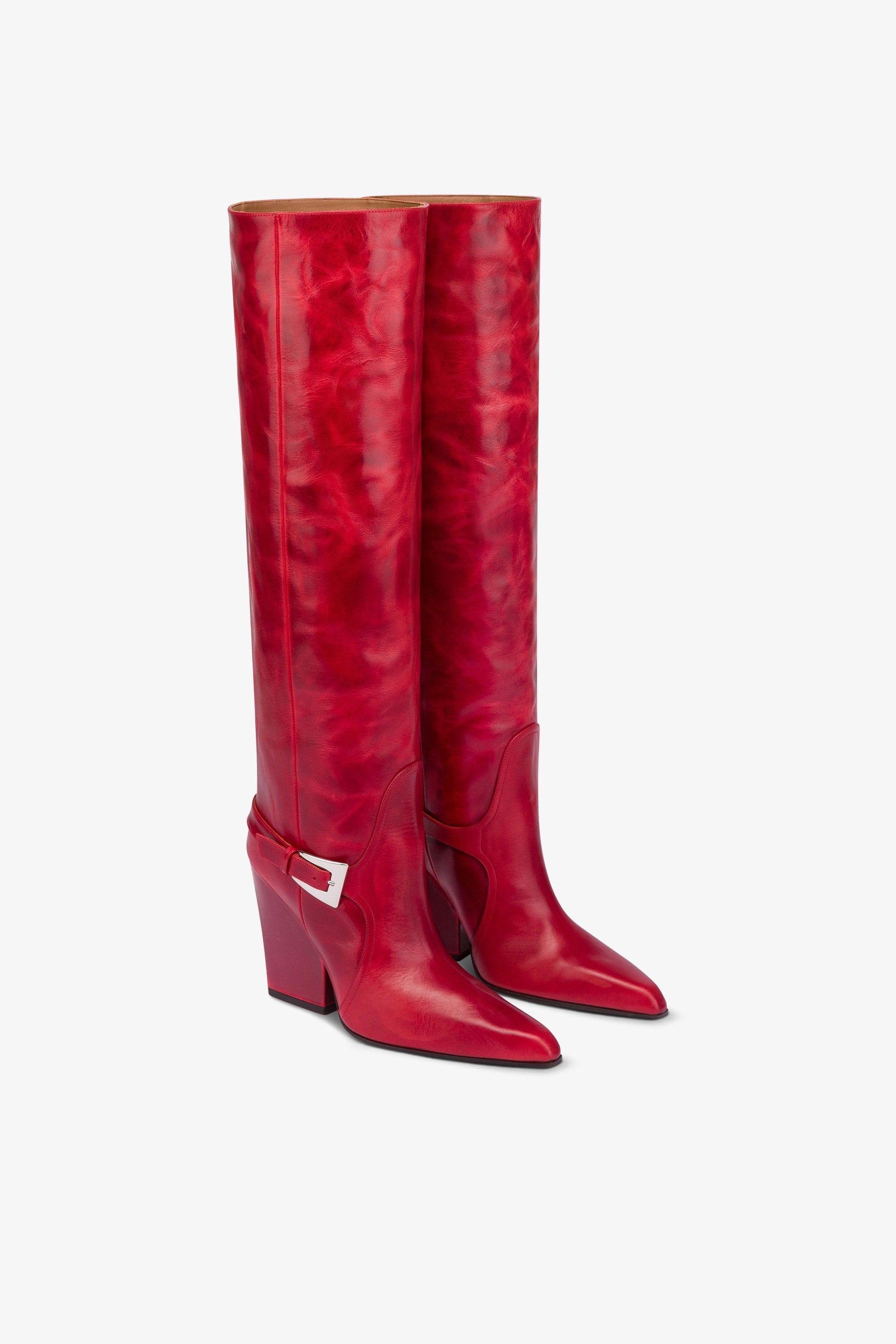 Tall, knee-high boots in shiny fiesta vintage leather