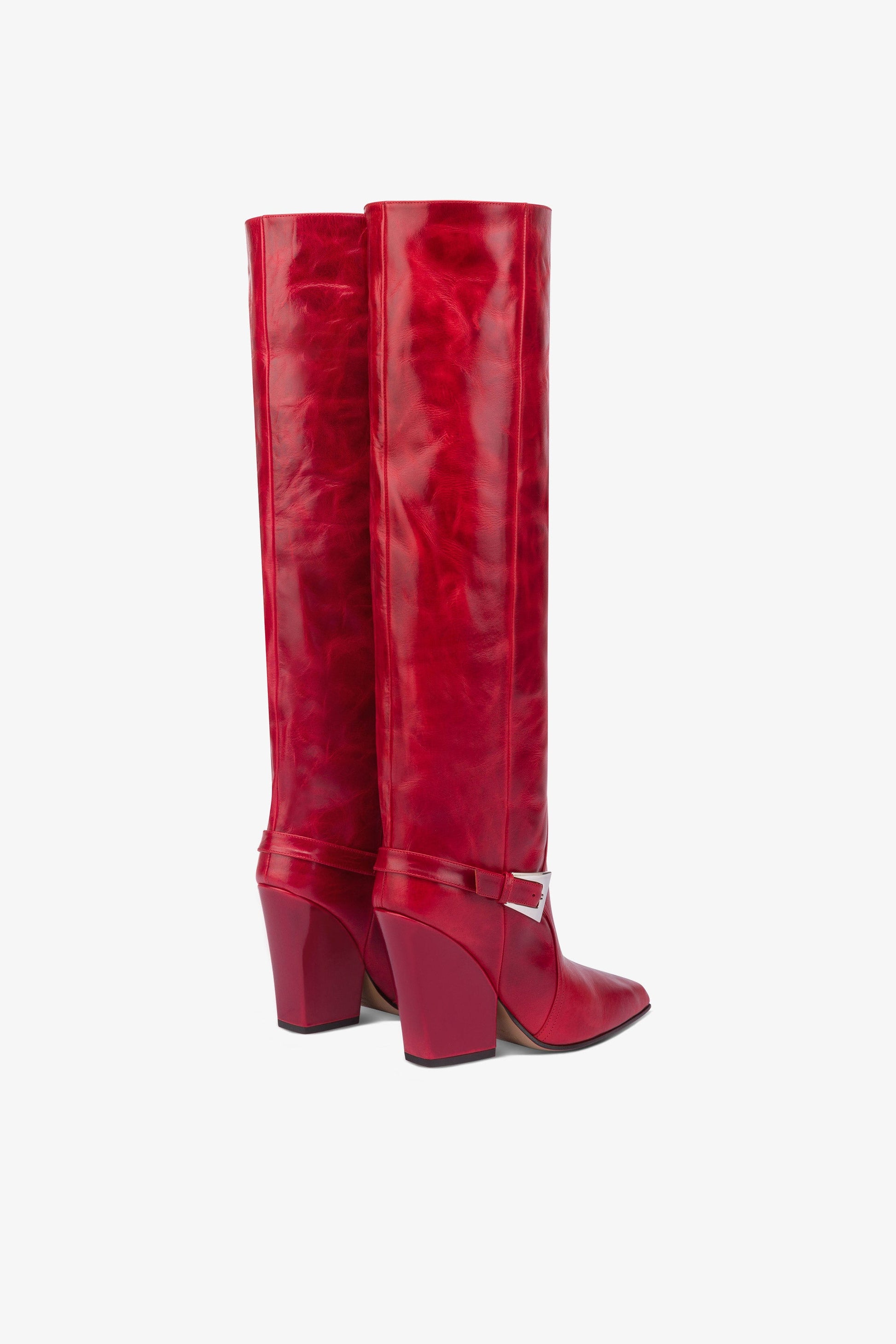 Tall, knee-high boots in shiny fiesta vintage leather