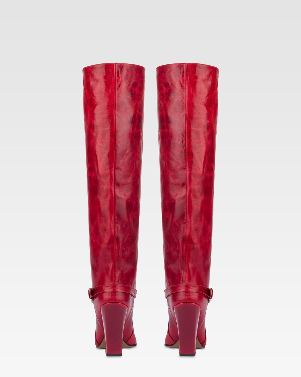 Tall, knee-high boots in shiny fiesta vintage leather