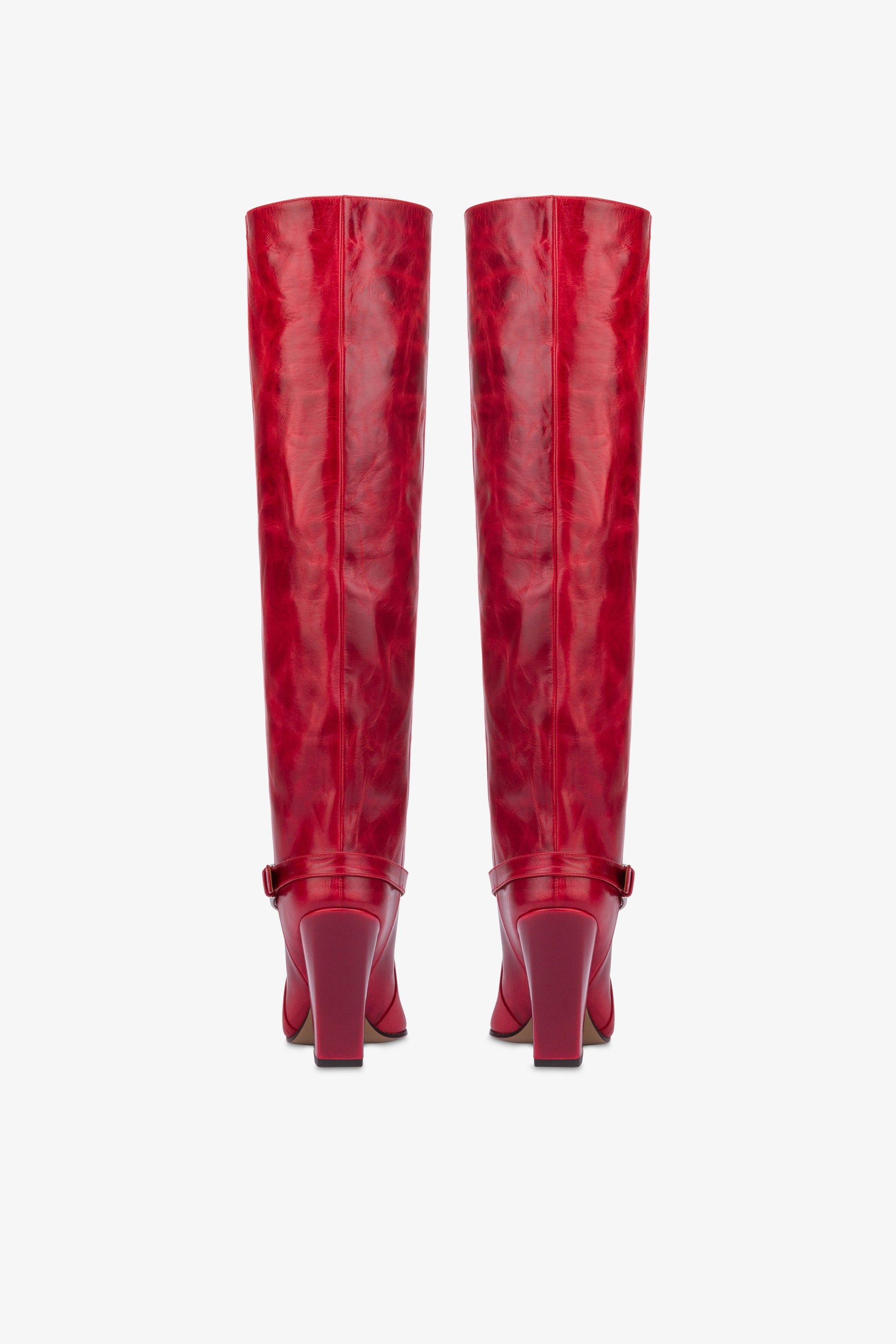 Tall, knee-high boots in shiny fiesta vintage leather