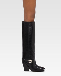 Tall, knee-high boots in shiny black vintage leather