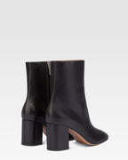 Pointed ankle boots in smooth black leather