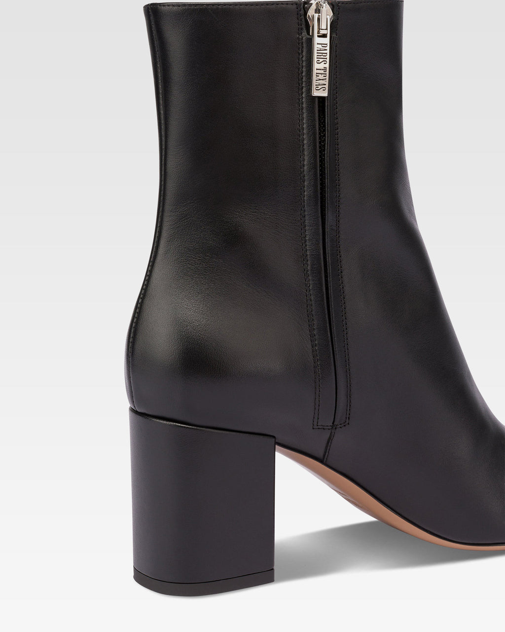 Pointed ankle boots in smooth black leather