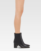 Pointed ankle boots in smooth black leather