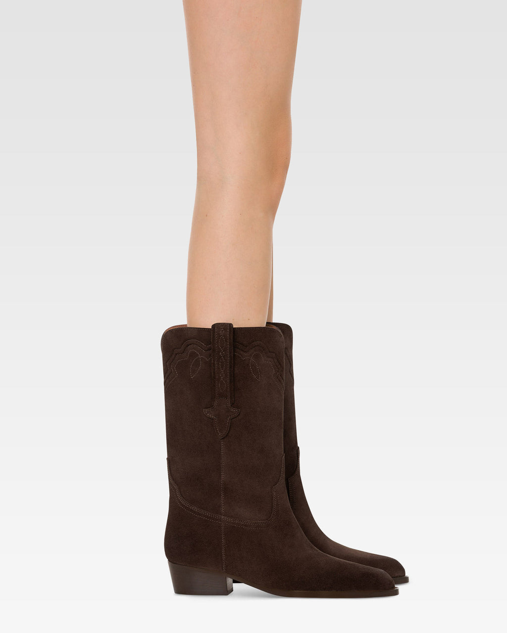 Boots in ebony calf suede leather