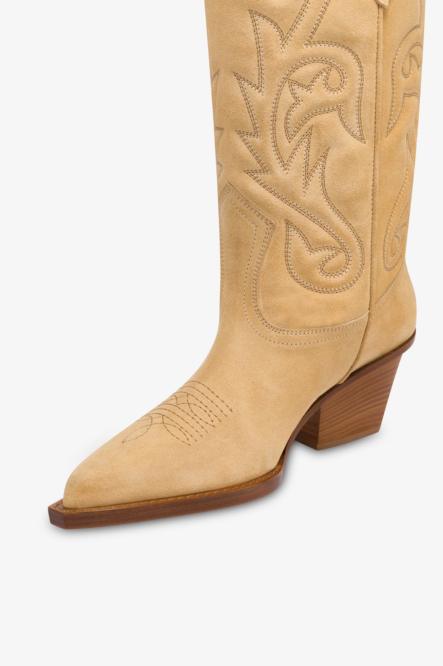 Boots in ecru suede leather