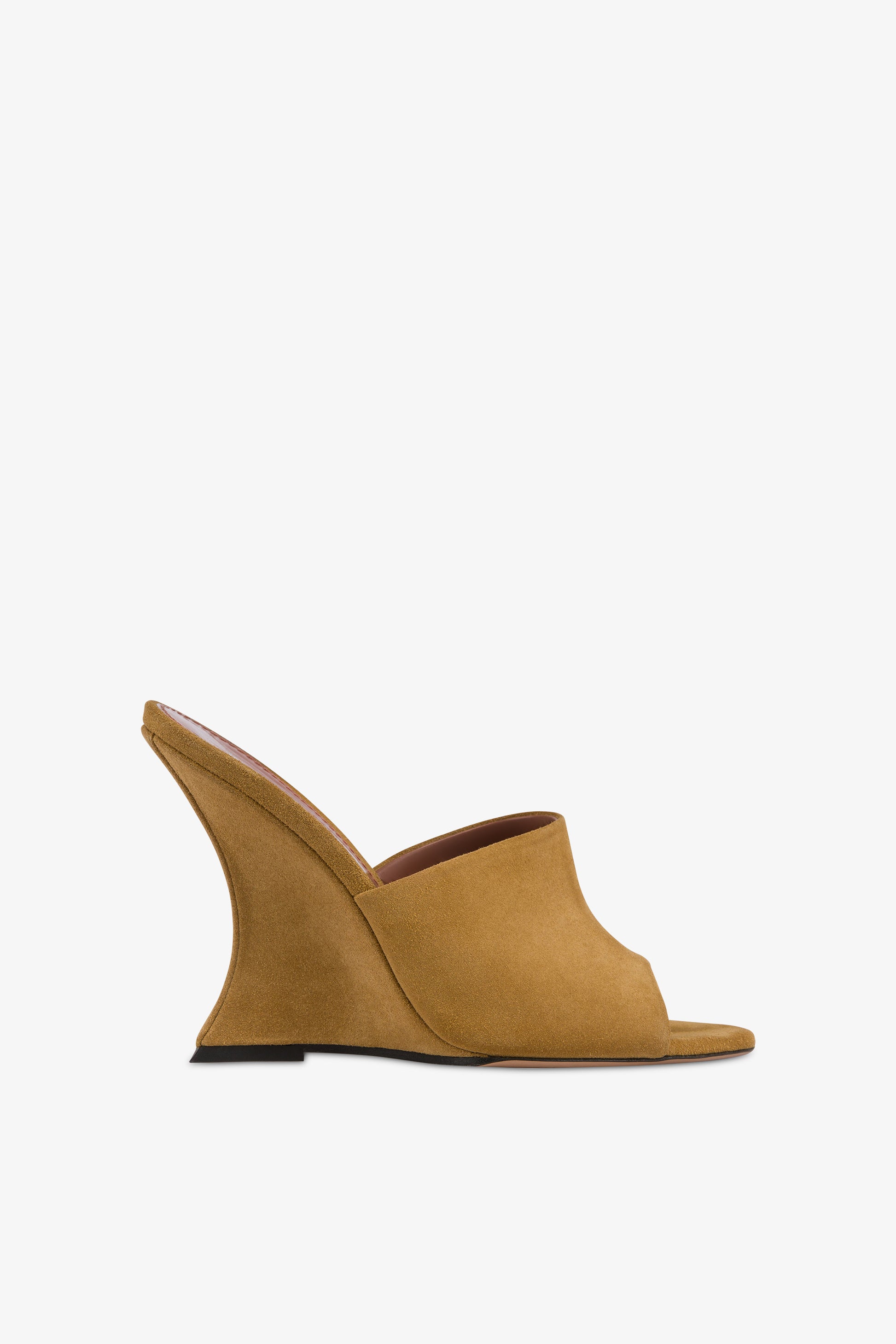 Mules in caramel suede leather