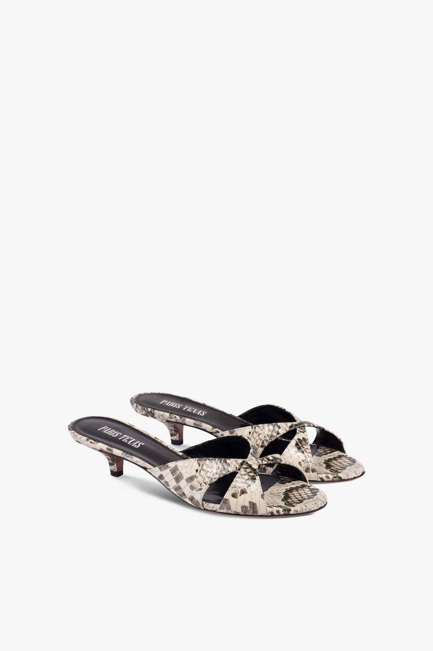 Mules in white python-print leather