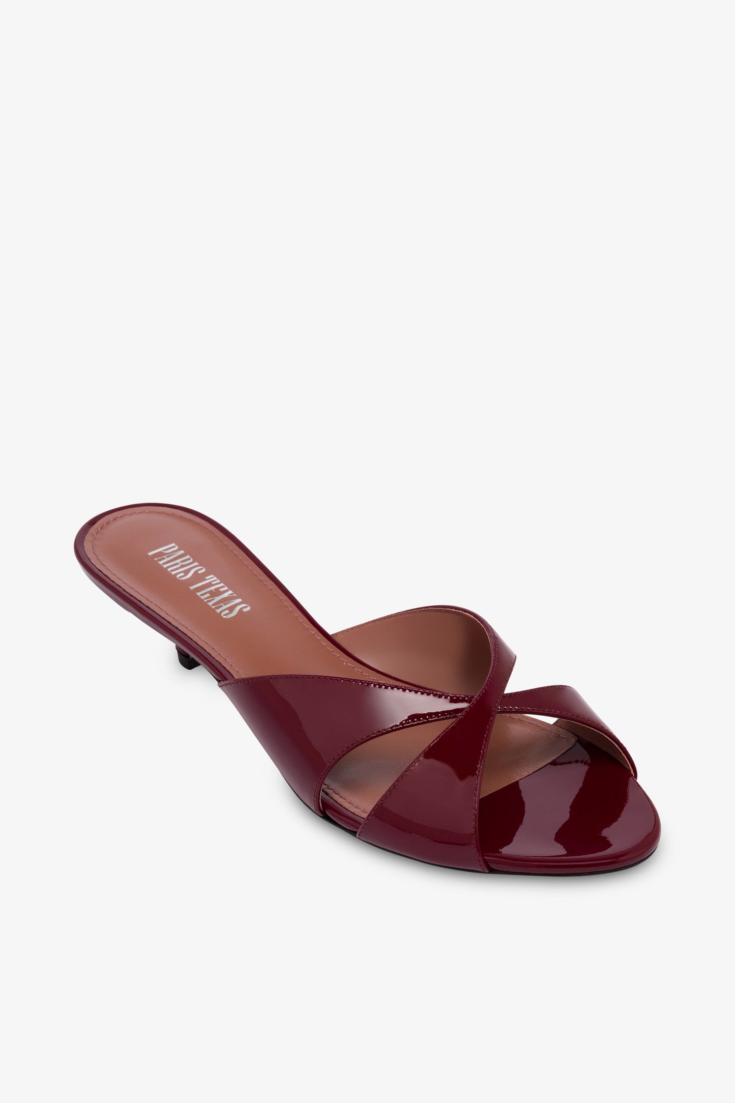 Mules in patent rouge noir leather