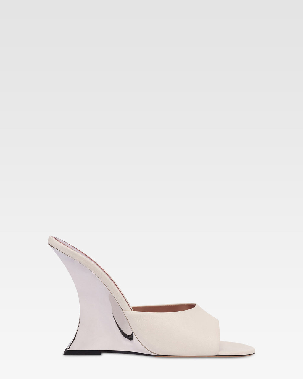 Mules in pelle bianca e zeppa galvanizzata