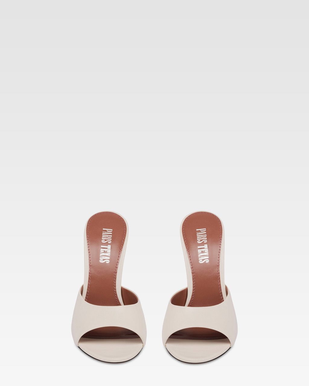 Mules in pelle bianca e zeppa galvanizzata