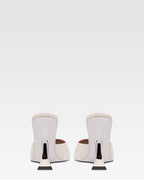 Mules in pelle bianca e zeppa galvanizzata