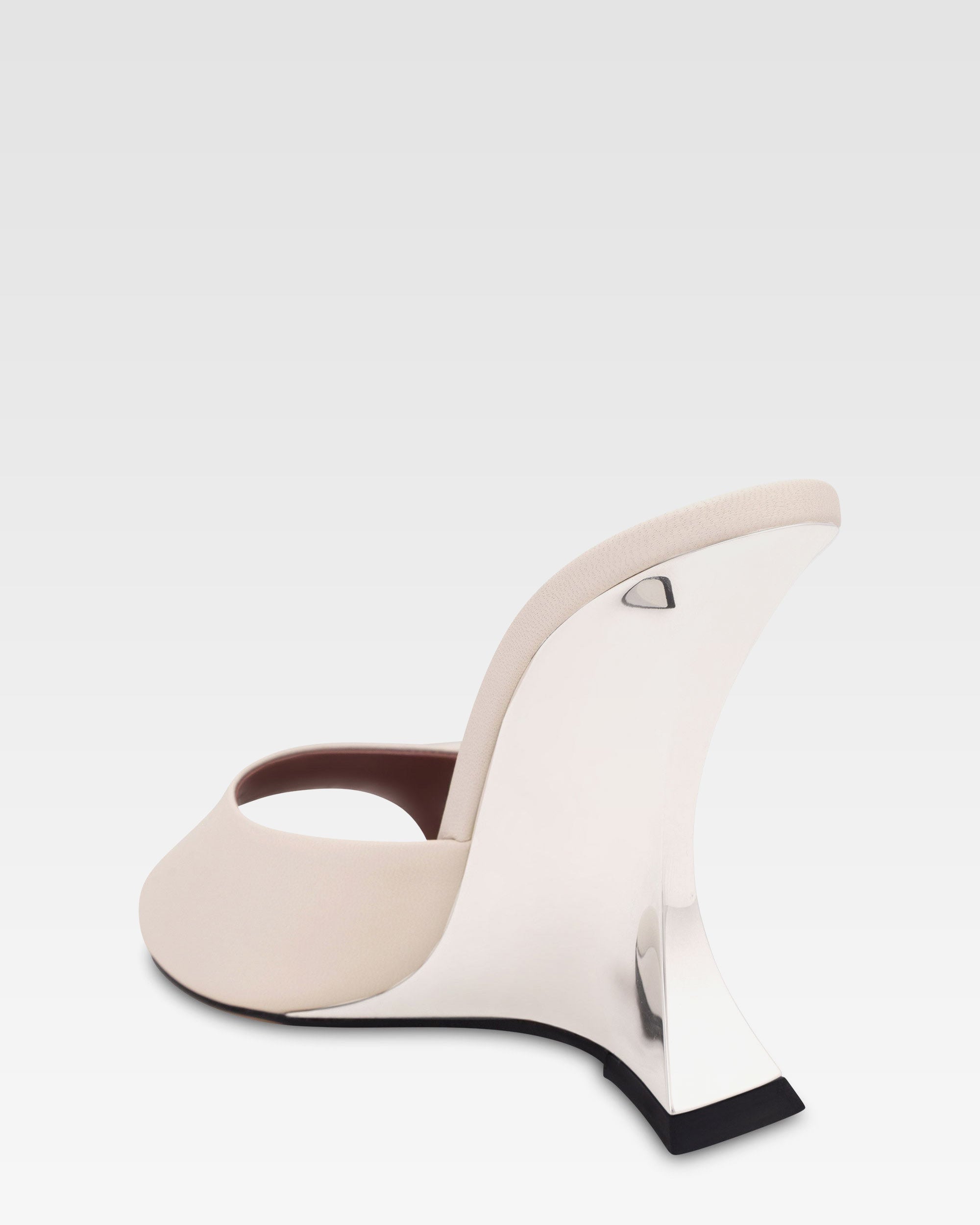 Mules in pelle bianca e zeppa galvanizzata