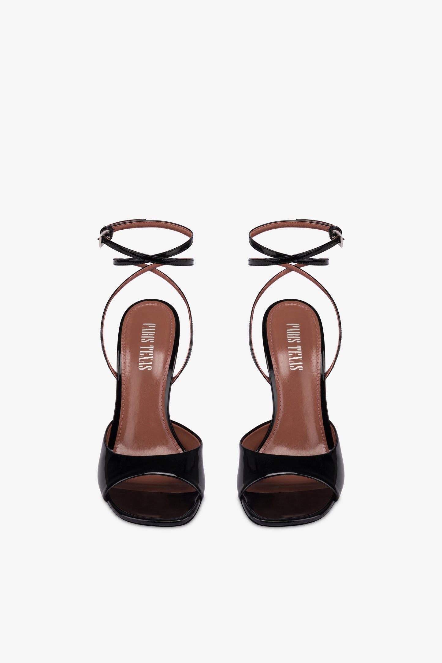 Sandals in black patent leather