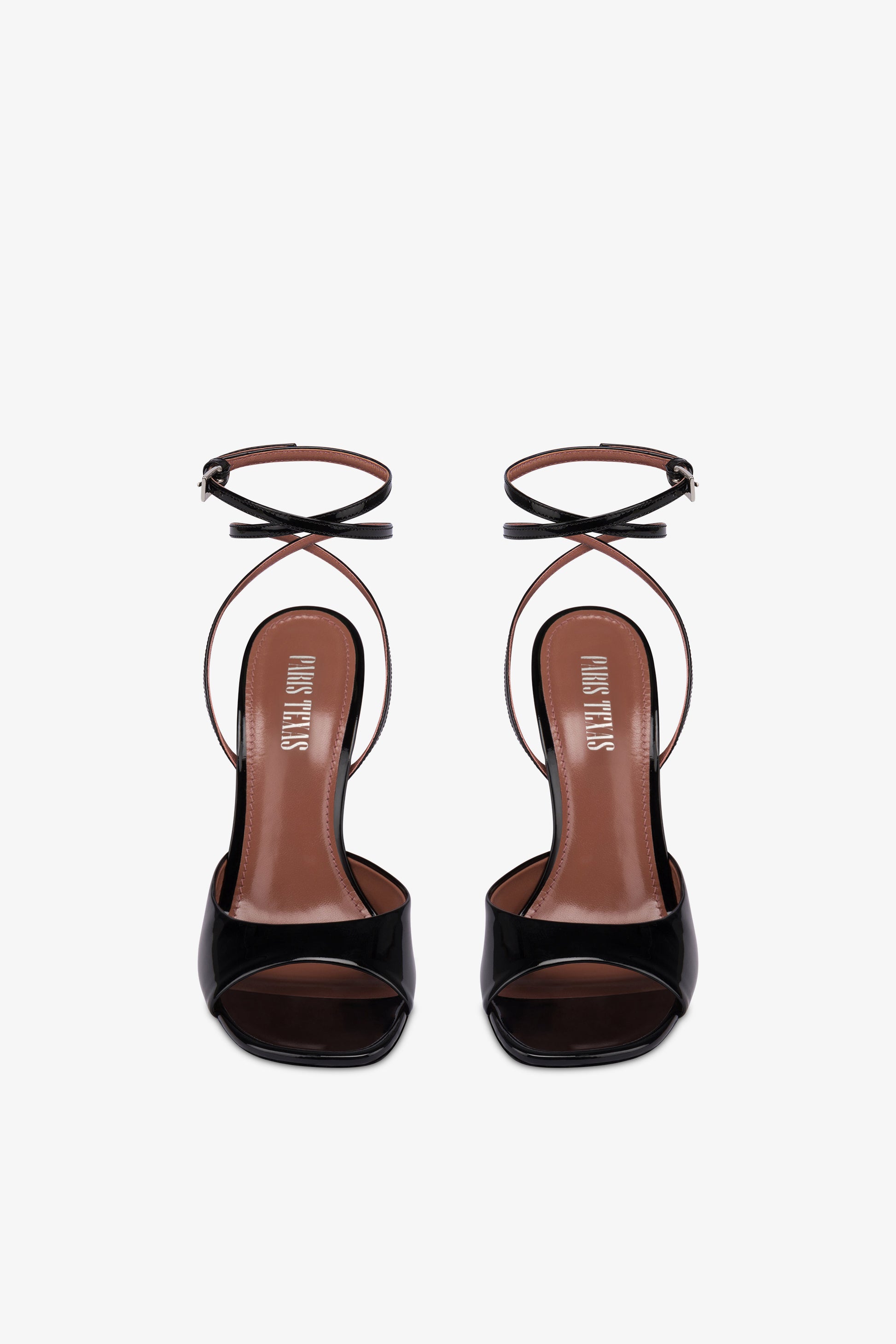 Sandals in black patent leather