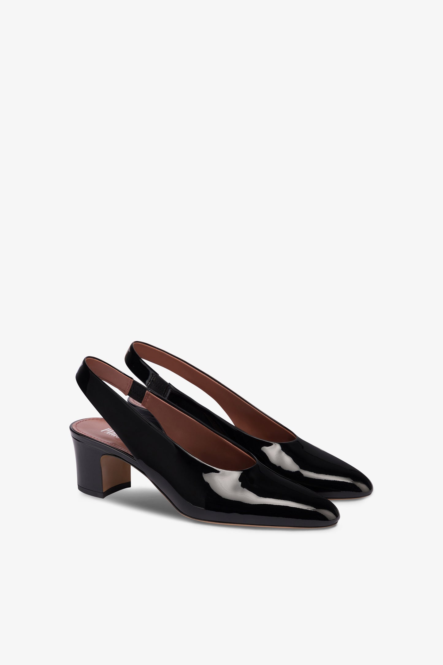 Slingbacks in black patent leather